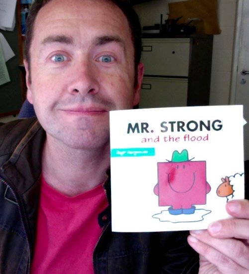 Photograph of the author and a Mr Man book